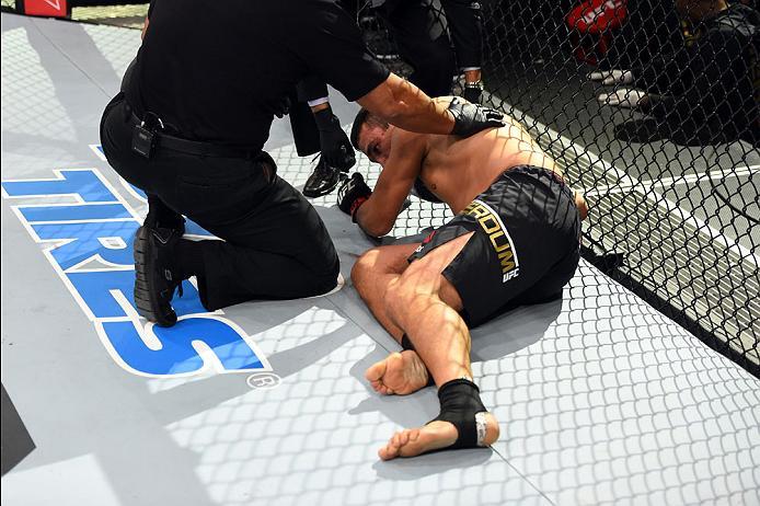 CURITIBA, BRAZIL - MAY 14: Fabricio Werdum of Brazil recovers after being knocked out by Stipe Miocic in their UFC heavyweight championship bout during the UFC 198 event at Arena da Baixada stadium on May 14, 2016 in Curitiba, Parana, Brazil. (Photo by