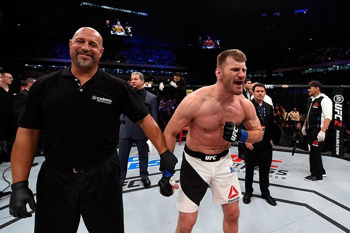 CURITIBA, BRAZIL - MAY 14: Stipe Miocic celebrates after defeating Fabricio Werdum of Brazil by KO in their UFC heavyweight championship bout during the UFC 198 event at Arena da Baixada stadium on May 14, 2016 in Curitiba, Parana, Brazil. (Photo by Jos