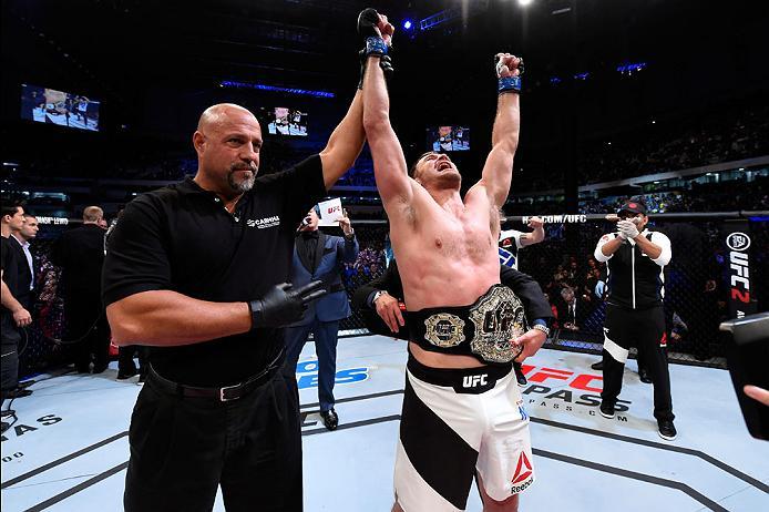 CURITIBA, BRAZIL - MAY 14: Stipe Miocic celebrates after defeating Fabricio Werdum of Brazil by KO in their UFC heavyweight championship bout during the UFC 198 event at Arena da Baixada stadium on May 14, 2016 in Curitiba, Parana, Brazil. (Photo by Jos