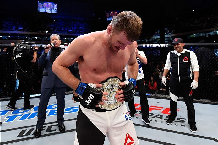CURITIBA, BRAZIL - MAY 14: Stipe Miocic celebrates after defeating Fabricio Werdum of Brazil by KO in their UFC heavyweight championship bout during the UFC 198 event at Arena da Baixada stadium on May 14, 2016 in Curitiba, Parana, Brazil. (Photo by Jos
