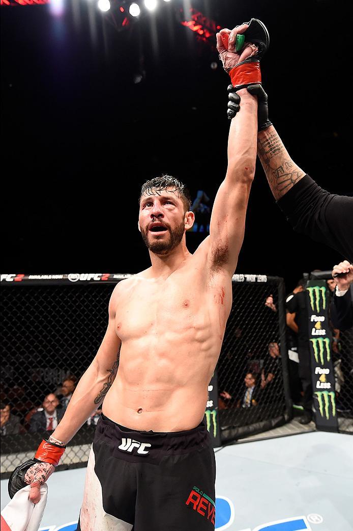 INGLEWOOD, CA - JUNE 04: Polo Reyes of Mexico celebrates after knocking out Dong Hyun Kim in the third round of their lightweight bout during the UFC 199 event at The Forum on June 4, 2016 in Inglewood, California. (Photo by Josh Hedges/Zuffa LLC/Zuffa