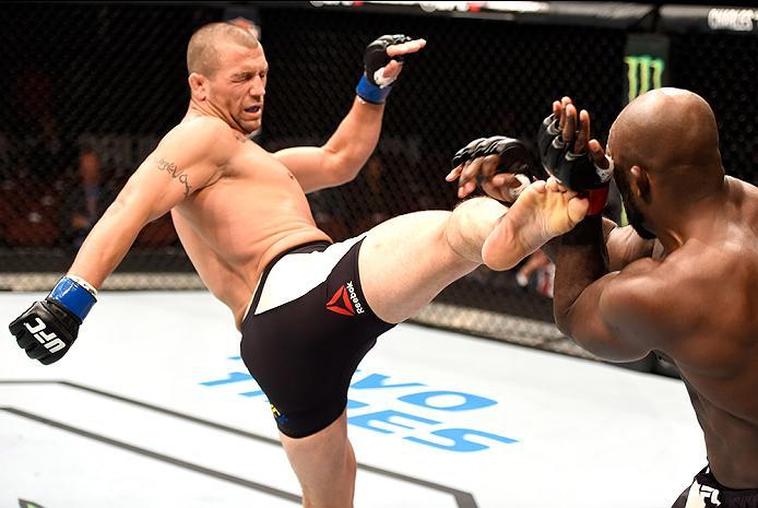 INGLEWOOD, CA - JUNE 04: Elvis Mutapcic of Bosnia lands a right kick on Kevin Casey in their middleweight bout during the UFC 199 event at The Forum on June 4, 2016 in Inglewood, California. (Photo by Josh Hedges/Zuffa LLC/Zuffa LLC via Getty Images)