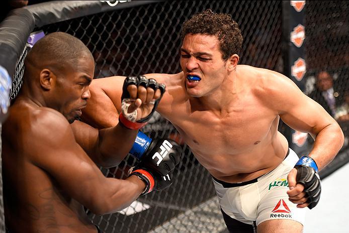 INGLEWOOD, CA - JUNE 04: Henrique da Silva of Brazil hits Jonathan Wilson in their light heavyweight bout during the UFC 199 event at The Forum on June 4, 2016 in Inglewood, California. (Photo by Josh Hedges/Zuffa LLC/Zuffa LLC via Getty Images)