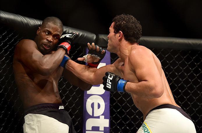 INGLEWOOD, CA - JUNE 04: Henrique da Silva of Brazil punches Jonathan Wilson in their light heavyweight bout during the UFC 199 event at The Forum on June 4, 2016 in Inglewood, California. (Photo by Harry How/Zuffa LLC/Zuffa LLC via Getty Images)