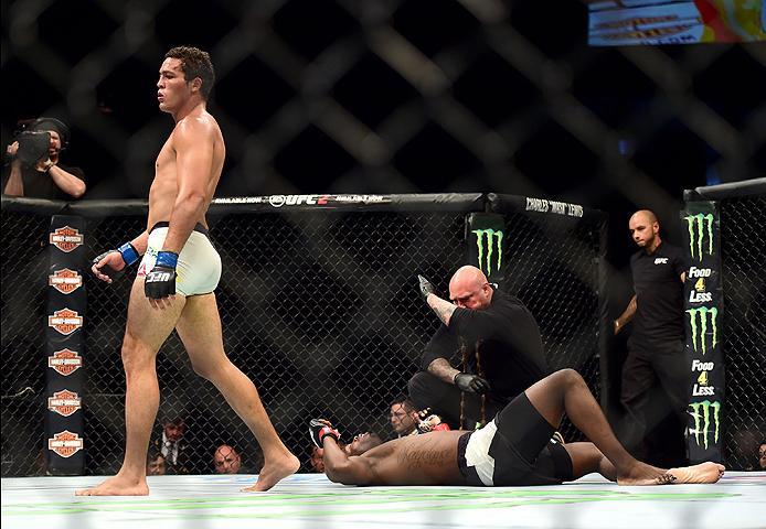 INGLEWOOD, CA - JUNE 04: Henrique da Silva walks away after the referee calls the fight in the second round against Jonathan Wilson in their light heavyweight bout during the UFC 199 event at The Forum on June 4, 2016 in Inglewood, California. (Photo by