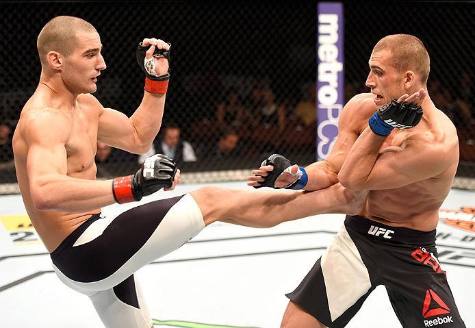 INGLEWOOD, CA - JUNE 04: Sean Strickland kicks Tom Breese of England in their welterweight bout during the UFC 199 event at The Forum on June 4, 2016 in Inglewood, California. (Photo by Josh Hedges/Zuffa LLC/Zuffa LLC via Getty Images)