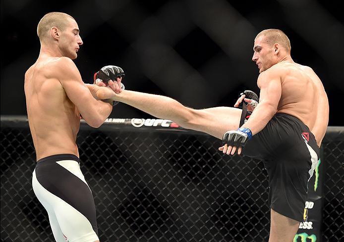 INGLEWOOD, CA - JUNE 04: Tom Breese of England kicks Sean Strickland in their welterweight bout during the UFC 199 event at The Forum on June 4, 2016 in Inglewood, California. (Photo by Harry How/Zuffa LLC/Zuffa LLC via Getty Images)