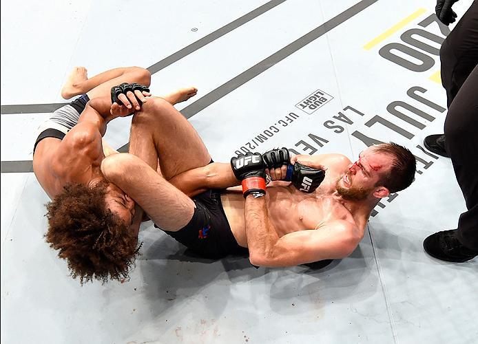 INGLEWOOD, CA - JUNE 04: Alex Caceres and Cole Miller wrestle during their featherweight bout during the UFC 199 event at The Forum on June 4, 2016 in Inglewood, California. (Photo by Josh Hedges/Zuffa LLC/Zuffa LLC via Getty Images)