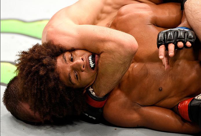 INGLEWOOD, CA - JUNE 04: Cole Miller wrestles Alex Caceres in their featherweight bout during the UFC 199 event at The Forum on June 4, 2016 in Inglewood, California. (Photo by Josh Hedges/Zuffa LLC/Zuffa LLC via Getty Images)