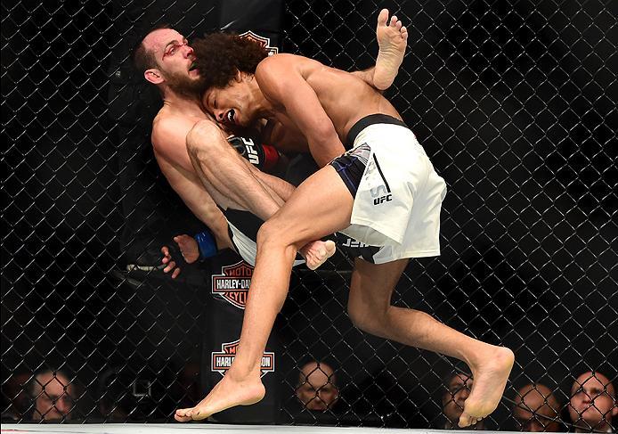 INGLEWOOD, CA - JUNE 04: Cole Miller and Alex Caceres wrestle in their featherweight bout during the UFC 199 event at The Forum on June 4, 2016 in Inglewood, California. (Photo by Harry How/Zuffa LLC/Zuffa LLC via Getty Images)