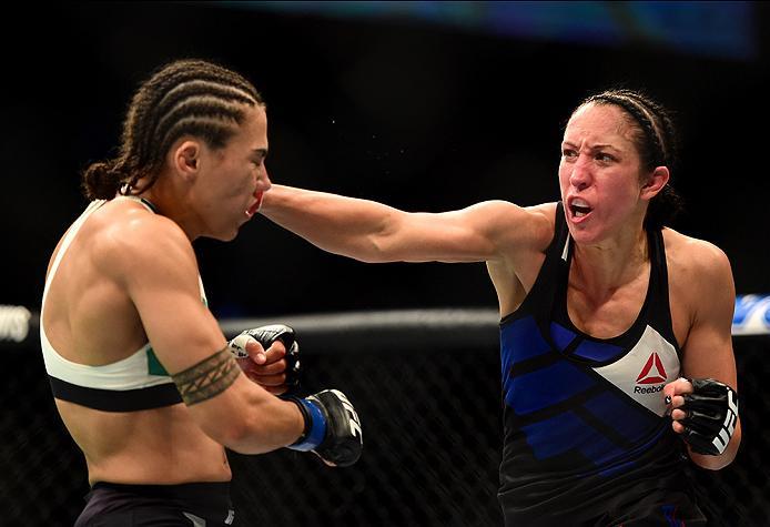 INGLEWOOD, CA - JUNE 04: Jessica Penne lands a right on Jessica Andrade in their women's strawweight bout during the UFC 199 event at The Forum on June 4, 2016 in Inglewood, California. (Photo by Harry How/Zuffa LLC/Zuffa LLC via Getty Images)