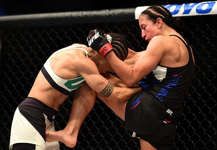INGLEWOOD, CA - JUNE 04: Jessica Andrade of Brazil punches Jessica Penne in their women's strawweight bout during the UFC 199 event at The Forum on June 4, 2016 in Inglewood, California. (Photo by Harry How/Zuffa LLC/Zuffa LLC via Getty Images)