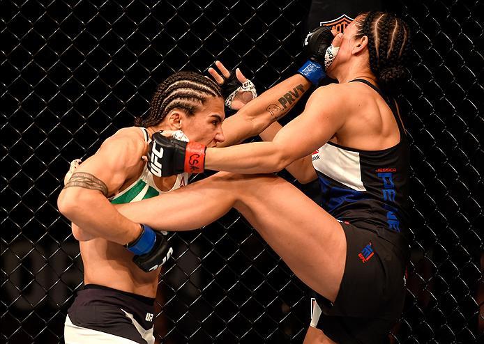 INGLEWOOD, CA - JUNE 04: Jessica Andrade of Brazil wrestles Jessica Penne in their women's strawweight bout during the UFC 199 event at The Forum on June 4, 2016 in Inglewood, California. (Photo by Josh Hedges/Zuffa LLC/Zuffa LLC via Getty Images)