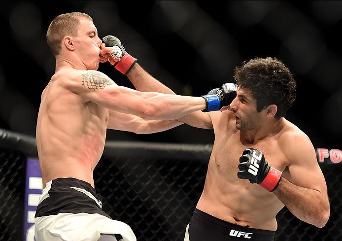 INGLEWOOD, CA - JUNE 04: James Vick and Beneil Darush of Iran exchange blows in their lightweight bout during the UFC 199 event at The Forum on June 4, 2016 in Inglewood, California. (Photo by Harry How/Zuffa LLC/Zuffa LLC via Getty Images)