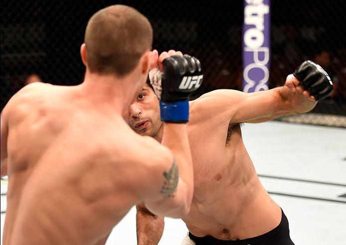 INGLEWOOD, CA - JUNE 04: James Vick and Beneil Darush of Iran exchange blows in their lightweight bout during the UFC 199 event at The Forum on June 4, 2016 in Inglewood, California. (Photo by Josh Hedges/Zuffa LLC/Zuffa LLC via Getty Images)