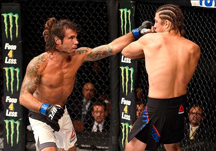 INGLEWOOD, CA - JUNE 04: Clay Guida punches Brian Ortega in their featherweight bout during the UFC 199 event at The Forum on June 4, 2016 in Inglewood, California. (Photo by Josh Hedges/Zuffa LLC/Zuffa LLC via Getty Images)