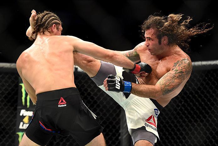INGLEWOOD, CA - JUNE 04: Clay Guida and Brian Ortega exchange blows in their featherweight bout during the UFC 199 event at The Forum on June 4, 2016 in Inglewood, California. (Photo by Harry How/Zuffa LLC/Zuffa LLC via Getty Images)
