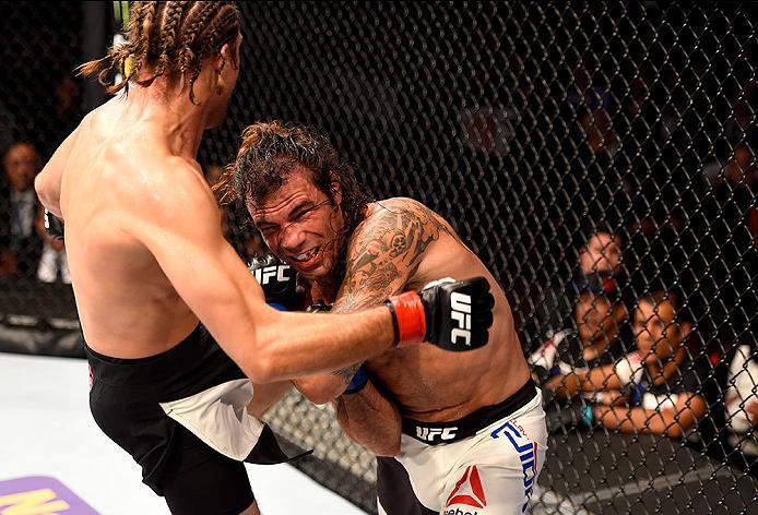 INGLEWOOD, CA - JUNE 04: Brian Ortega kicks Clay Guida in their featherweight bout during the UFC 199 event at The Forum on June 4, 2016 in Inglewood, California. (Photo by Josh Hedges/Zuffa LLC/Zuffa LLC via Getty Images)