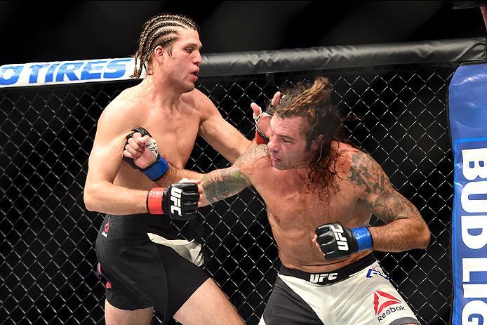 INGLEWOOD, CA - JUNE 04: Brian Ortega and Clay Guida exchange blows in their featherweight bout during the UFC 199 event at The Forum on June 4, 2016 in Inglewood, California. (Photo by Harry How/Zuffa LLC/Zuffa LLC via Getty Images)