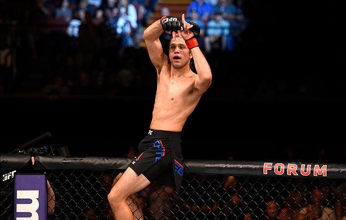 INGLEWOOD, CA - JUNE 04: Brian Ortega celebrates after his TKO in the third round against Clay Guida in their featherweight bout during the UFC 199 event at The Forum on June 4, 2016 in Inglewood, California. (Photo by Josh Hedges/Zuffa LLC/Zuffa LLC vi