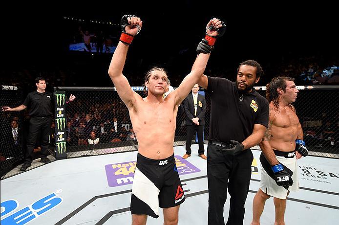 INGLEWOOD, CA - JUNE 04: Brian Ortega celebrates after his TKO win in the third round against Clay Guida in their featherweight bout during the UFC 199 event at The Forum on June 4, 2016 in Inglewood, California. (Photo by Josh Hedges/Zuffa LLC/Zuffa LL