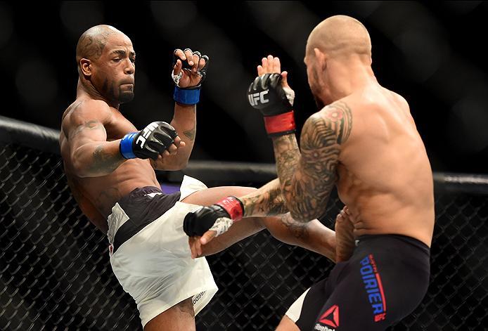 INGLEWOOD, CA - JUNE 04: Bobby Green kicks Dustin Poirier in their lightweight bout during the UFC 199 event at The Forum on June 4, 2016 in Inglewood, California. (Photo by Harry How/Zuffa LLC/Zuffa LLC via Getty Images)
