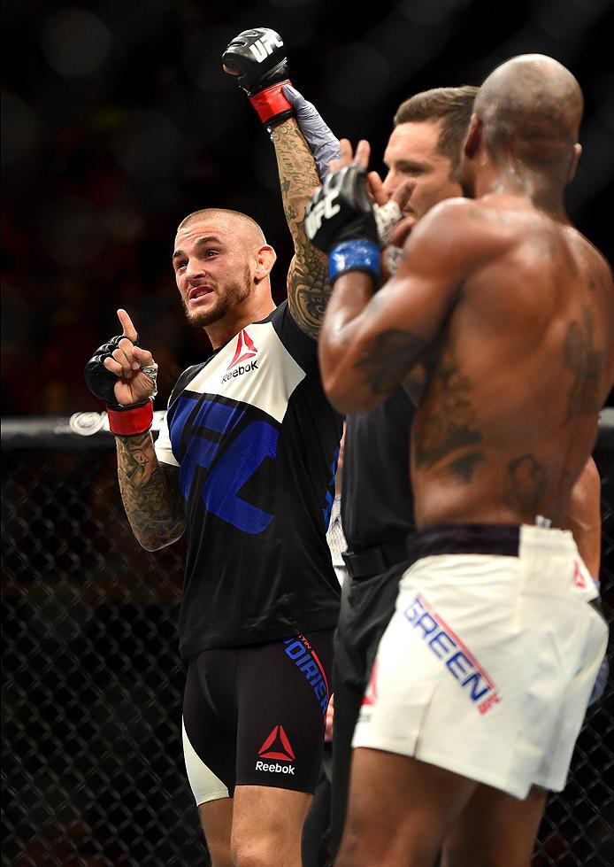 INGLEWOOD, CA - JUNE 04: Dustin Poirier celebrates after his TKO win in the frist round against Bobby Green in their lightweight bout during the UFC 199 event at The Forum on June 4, 2016 in Inglewood, California. (Photo by Harry How/Zuffa LLC/Zuffa LLC