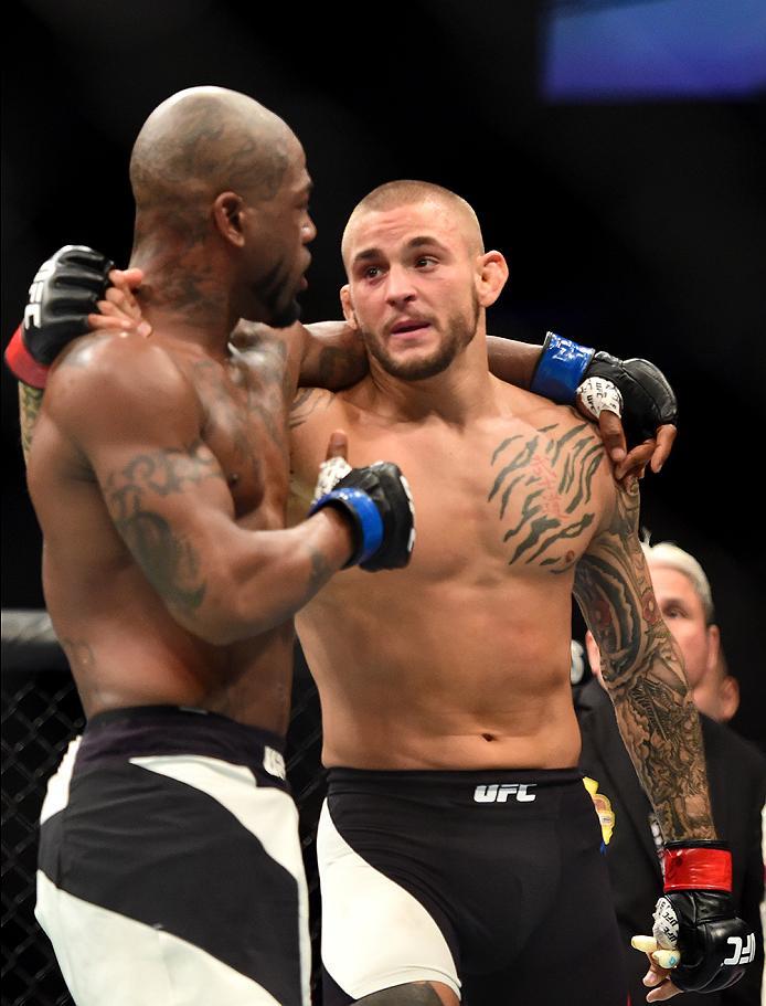 INGLEWOOD, CA - JUNE 04: Bobby Green talks to Dustin Poirier after his TKO defeat in the frist round to Dustin Poirier in their lightweight bout during the UFC 199 event at The Forum on June 4, 2016 in Inglewood, California. (Photo by Harry How/Zuffa LLC