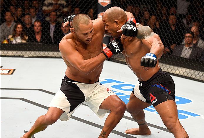 INGLEWOOD, CA - JUNE 04: Dan Henderson and Hector Lombard of Cuba exchange blows in their middleweight bout during the UFC 199 event at The Forum on June 4, 2016 in Inglewood, California. (Photo by Josh Hedges/Zuffa LLC/Zuffa LLC via Getty Images)