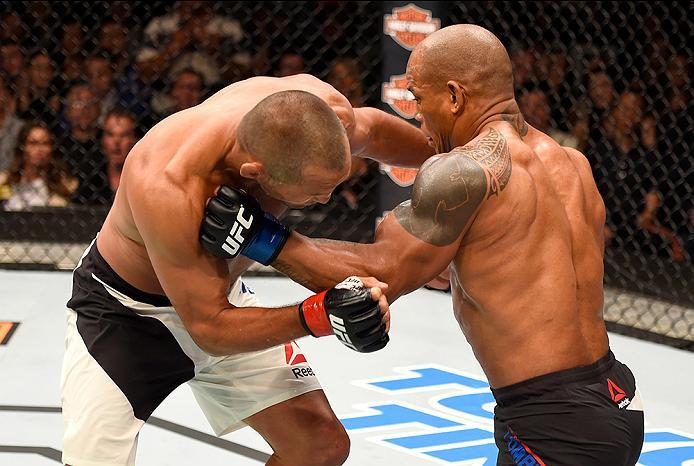 INGLEWOOD, CA - JUNE 04: Dan Henderson and Hector Lombard of Cuba exchange blows in their middleweight bout during the UFC 199 event at The Forum on June 4, 2016 in Inglewood, California. (Photo by Josh Hedges/Zuffa LLC/Zuffa LLC via Getty Images)