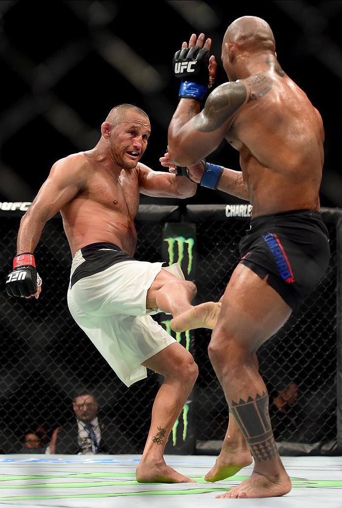 INGLEWOOD, CA - JUNE 04: Dan Henderson kicks Hector Lombard of Cuba in their middleweight bout during the UFC 199 event at The Forum on June 4, 2016 in Inglewood, California. (Photo by Harry How/Zuffa LLC/Zuffa LLC via Getty Images)