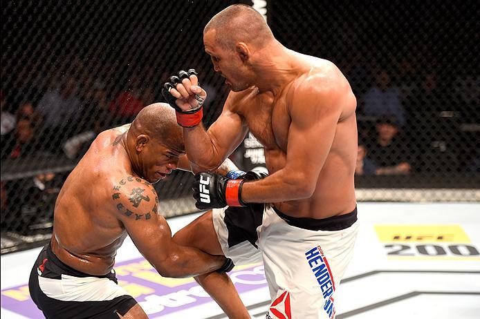 INGLEWOOD, CA - JUNE 04: Dan Henderson and Hector Lombard of Cuba exchange blows in their middleweight bout during the UFC 199 event at The Forum on June 4, 2016 in Inglewood, California. (Photo by Josh Hedges/Zuffa LLC/Zuffa LLC via Getty Images)