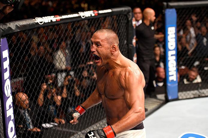 INGLEWOOD, CA - JUNE 04: Dan Henderson celebrates after his knockout in the second round against Hector Lombard in their middleweight bout during the UFC 199 event at The Forum on June 4, 2016 in Inglewood, California. (Photo by Josh Hedges/Zuffa LLC/Zu