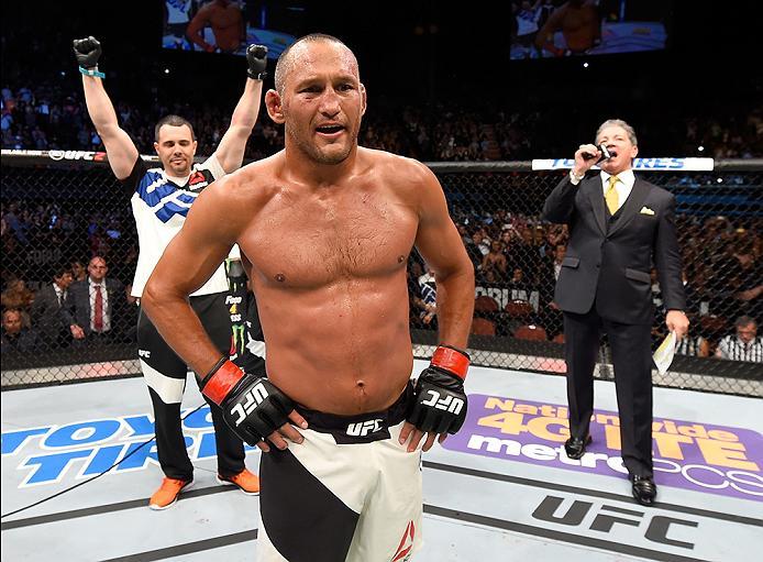 INGLEWOOD, CA - JUNE 04: Dan Henderson celebrates after his knockout win in the second round against Hector Lombard in their middleweight bout during the UFC 199 event at The Forum on June 4, 2016 in Inglewood, California. (Photo by Josh Hedges/Zuffa L