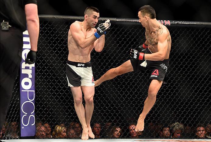INGLEWOOD, CA - JUNE 04: Max Holloway kicks Ricardo Lamas in their featherweight bout during the UFC 199 event at The Forum on June 4, 2016 in Inglewood, California. (Photo by Harry How/Zuffa LLC/Zuffa LLC via Getty Images)