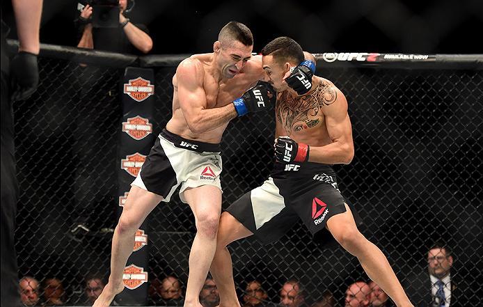 INGLEWOOD, CA - JUNE 04: Ricardo Lamas punches Max Holloway in their featherweight bout during the UFC 199 event at The Forum on June 4, 2016 in Inglewood, California. (Photo by Harry How/Zuffa LLC/Zuffa LLC via Getty Images)