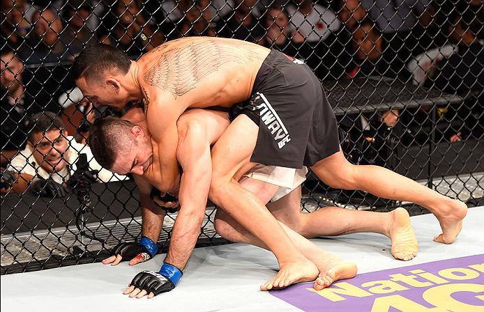 INGLEWOOD, CA - JUNE 04: Max Holloway wrestles Ricardo Lamas in their featherweight bout during the UFC 199 event at The Forum on June 4, 2016 in Inglewood, California. (Photo by Josh Hedges/Zuffa LLC/Zuffa LLC via Getty Images)