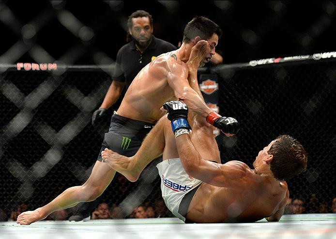 INGLEWOOD, CA - JUNE 04: Dominick Cruz and Urijah Faber exchange blows during the UFC 199 event at The Forum on June 4, 2016 in Inglewood, California. (Photo by Brandon Magnus/Zuffa LLC/Zuffa LLC via Getty Images)