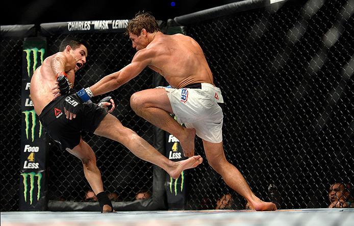 INGLEWOOD, CA - JUNE 04: Urijah Faber and Dominick Cruz exchange blows during the UFC 199 event at The Forum on June 4, 2016 in Inglewood, California. (Photo by Brandon Magnus/Zuffa LLC/Zuffa LLC via Getty Images)