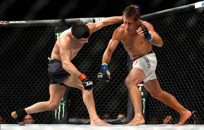 INGLEWOOD, CA - JUNE 04: Dominick Cruz throws a left punch at Urijah Faber during the UFC 199 event at The Forum on June 4, 2016 in Inglewood, California. (Photo by Brandon Magnus/Zuffa LLC/Zuffa LLC via Getty Images)