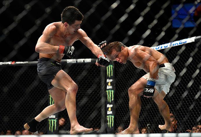 INGLEWOOD, CA - JUNE 04: Dominick Cruz throws a left punch at Urijah Faber during the UFC 199 event at The Forum on June 4, 2016 in Inglewood, California. (Photo by Brandon Magnus/Zuffa LLC/Zuffa LLC via Getty Images)