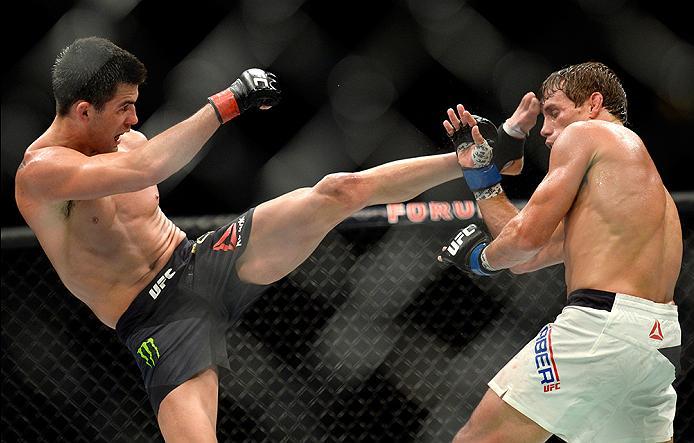INGLEWOOD, CA - JUNE 04: Dominick Cruz kicks Urijah Faber during the UFC 199 event at The Forum on June 4, 2016 in Inglewood, California. (Photo by Brandon Magnus/Zuffa LLC/Zuffa LLC via Getty Images)