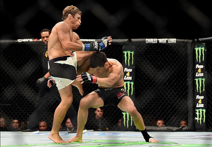 INGLEWOOD, CA - JUNE 04: Urijah Faber knees Dominick Cruz in their UFC bantamweight championship bout during the UFC 199 event at The Forum on June 4, 2016 in Inglewood, California. (Photo by Harry How/Zuffa LLC/Zuffa LLC via Getty Images)