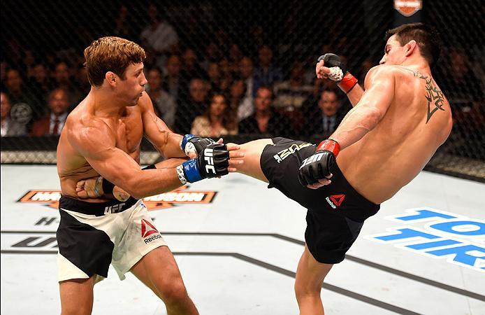 INGLEWOOD, CA - JUNE 04: Dominick Cruz kicks Urijah Faber in their UFC bantamweight championship bout during the UFC 199 event at The Forum on June 4, 2016 in Inglewood, California. (Photo by Josh Hedges/Zuffa LLC/Zuffa LLC via Getty Images)