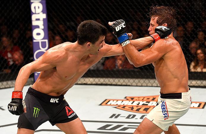 INGLEWOOD, CA - JUNE 04: Dominick Cruz punches Urijah Faber in their UFC bantamweight championship bout during the UFC 199 event at The Forum on June 4, 2016 in Inglewood, California. (Photo by Josh Hedges/Zuffa LLC/Zuffa LLC via Getty Images)