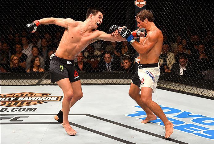 INGLEWOOD, CA - JUNE 04: Dominick Cruz throws a left punch at Urijah Faber in their UFC bantamweight championship bout during the UFC 199 event at The Forum on June 4, 2016 in Inglewood, California. (Photo by Josh Hedges/Zuffa LLC/Zuffa LLC via Getty Im