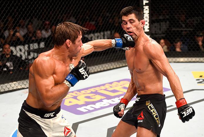 INGLEWOOD, CA - JUNE 04: Urijah Faber throws a left punch at Dominick Cruz in their UFC bantamweight championship bout during the UFC 199 event at The Forum on June 4, 2016 in Inglewood, California. (Photo by Josh Hedges/Zuffa LLC/Zuffa LLC via Getty Ima