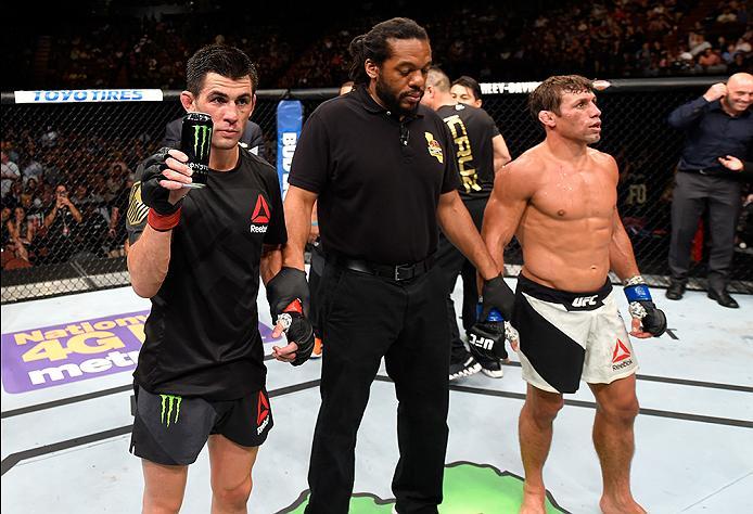 INGLEWOOD, CA - JUNE 04: Dominick Cruz celebrates after defeating Urijah Faber by unanimous decision in their UFC bantamweight championship bout during the UFC 199 event at The Forum on June 4, 2016 in Inglewood, California. (Photo by Josh Hedges/Zuffa