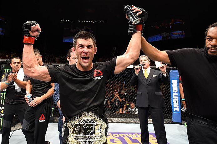 INGLEWOOD, CA - JUNE 04: Dominick Cruz celebrates after defeating Urijah Faber by unanimous decision in their UFC bantamweight championship bout during the UFC 199 event at The Forum on June 4, 2016 in Inglewood, California. (Photo by Josh Hedges/Zuffa