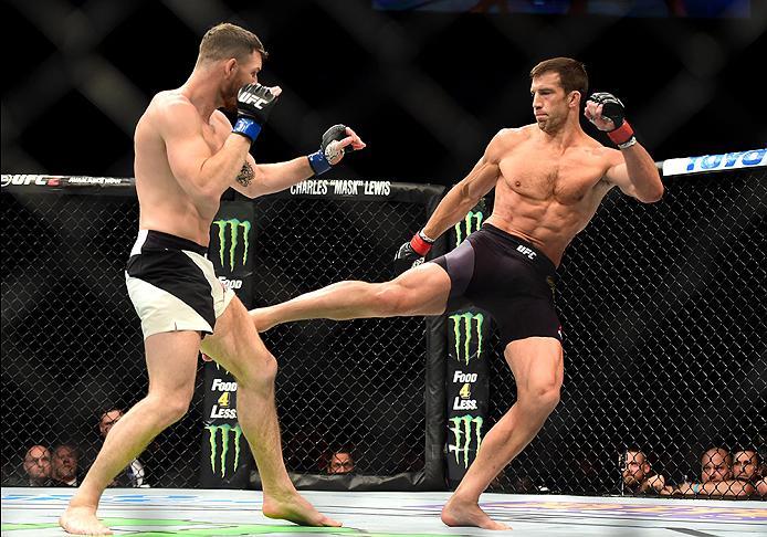 INGLEWOOD, CA - JUNE 04: Luke Rockhold kicks Michael Bisping of England in their UFC middleweight championship bout during the UFC 199 event at The Forum on June 4, 2016 in Inglewood, California. (Photo by Harry How/Zuffa LLC/Zuffa LLC via Getty Images)